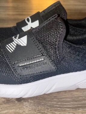 NEW UNDER ARMOUR SHOES SIZE ONE. No box. Never worn.